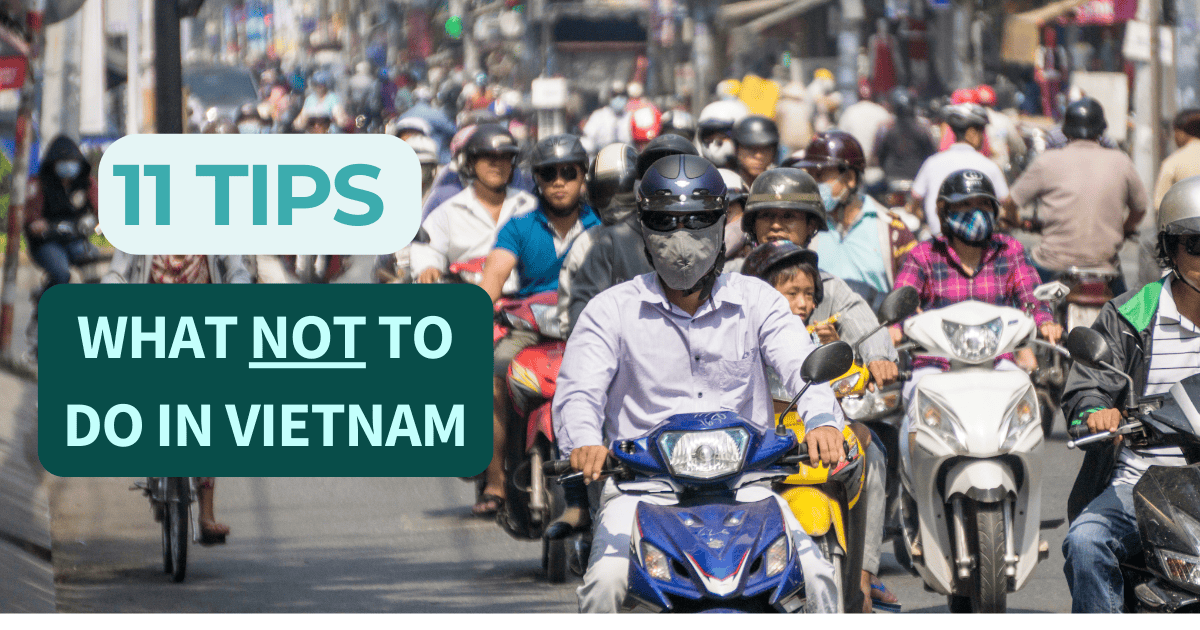 The image depicts a bustling street in Vietnam, filled with many motorcyclists. The riders, both men and women, wear helmets, and some have face masks. Overlaid text at the top states "11 TIPS" and below that, in a larger font, "WHAT NOT TO DO IN VIETNAM." The scene captures the dense, everyday traffic typical of urban areas in Vietnam, emphasizing the local commute culture.