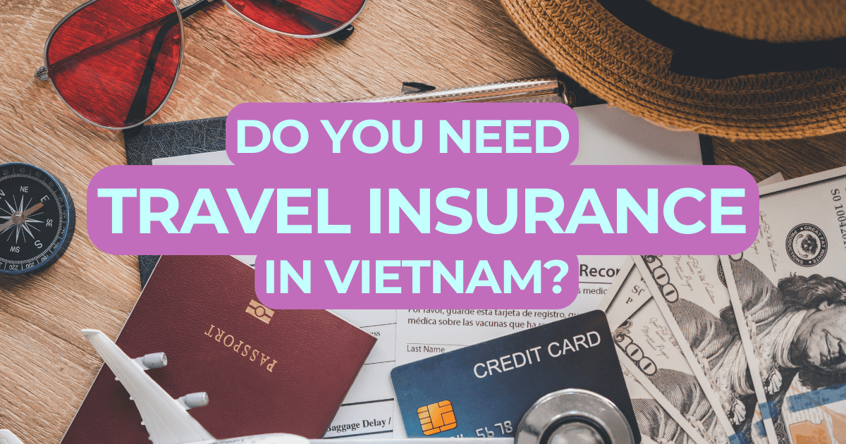 The image features a vibrant travel-themed composition with various travel essentials like sunglasses, a compass, passports, and a credit card scattered across a wooden table. Overlaid in bold, purple text is the question "DO YOU NEED TRAVEL INSURANCE IN VIETNAM?" This creates a striking visual that merges practical travel imagery with a prompt about travel insurance necessities for Vietnam.